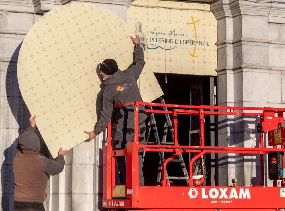 9.10.26 Lourdes facade coverup